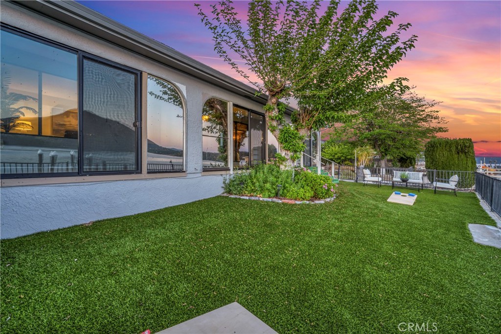 7723 Cora Drive Lucerne, CA 95458 - Photo 38 of 56 a view of a house with a yard
