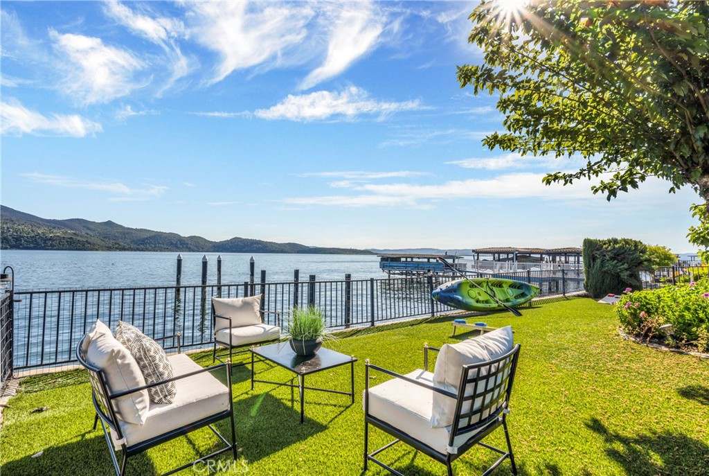 7723 Cora Drive Lucerne, CA 95458 - Photo 4 of 56 a view of a swimming pool with a lounge chairs
