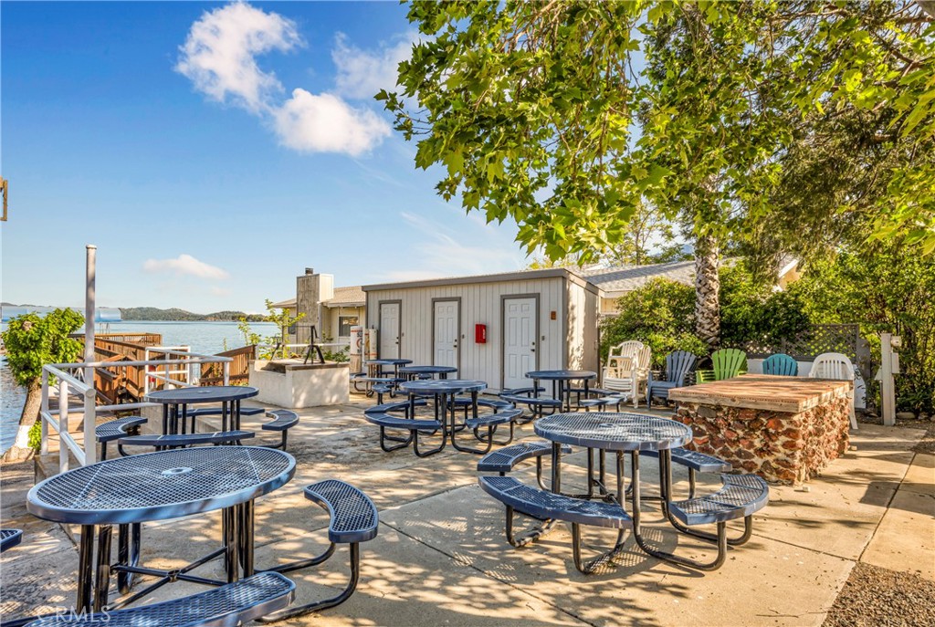 7723 Cora Drive Lucerne, CA 95458 - Photo 44 of 56 a view of a patio with dining table and chairs