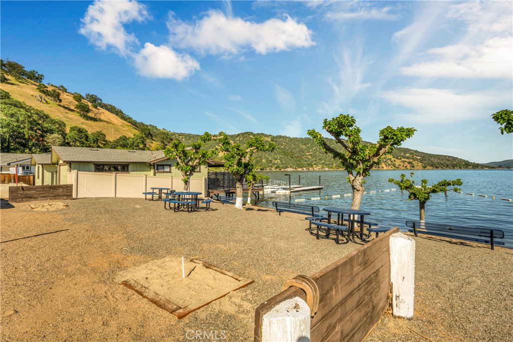 7723 Cora Drive Lucerne, CA 95458 - Photo 48 of 56 a view of a house with outdoor space and sitting area