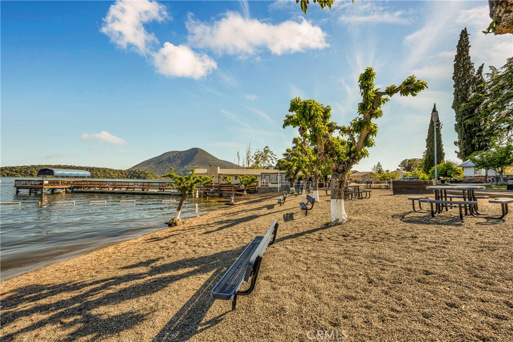 7723 Cora Drive Lucerne, CA 95458 - Photo 51 of 56 a view of a lake with chairs