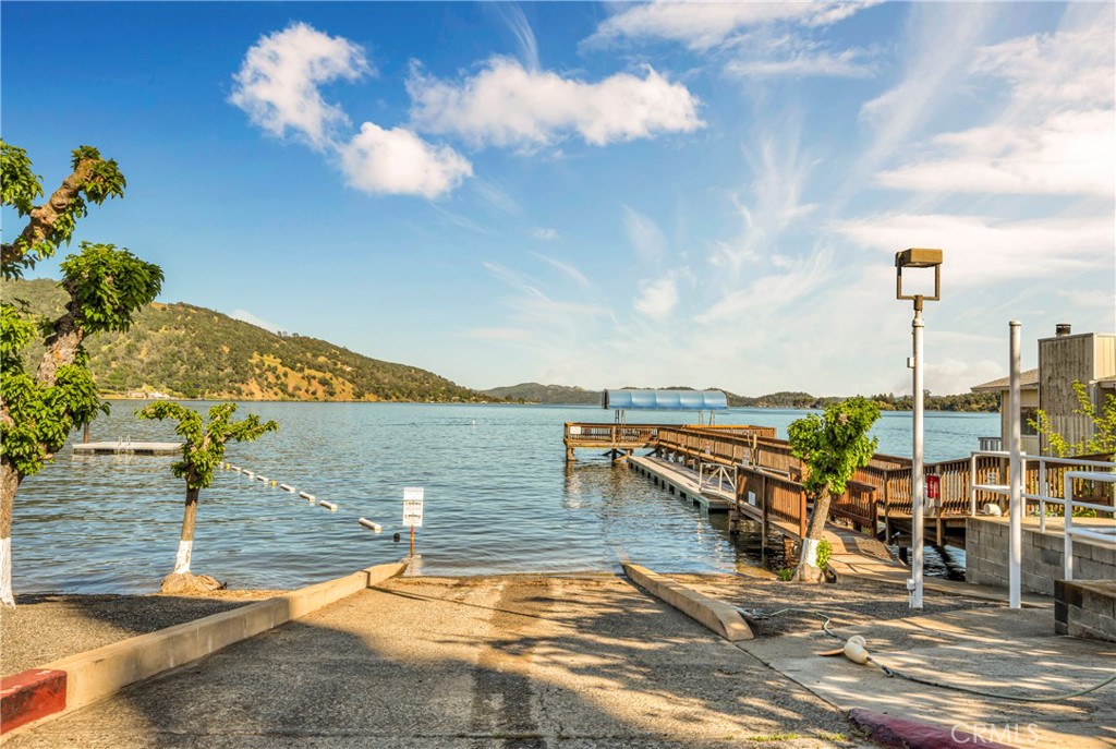 7723 Cora Drive Lucerne, CA 95458 - Photo 52 of 56 a view of a lake with a mountain in the background