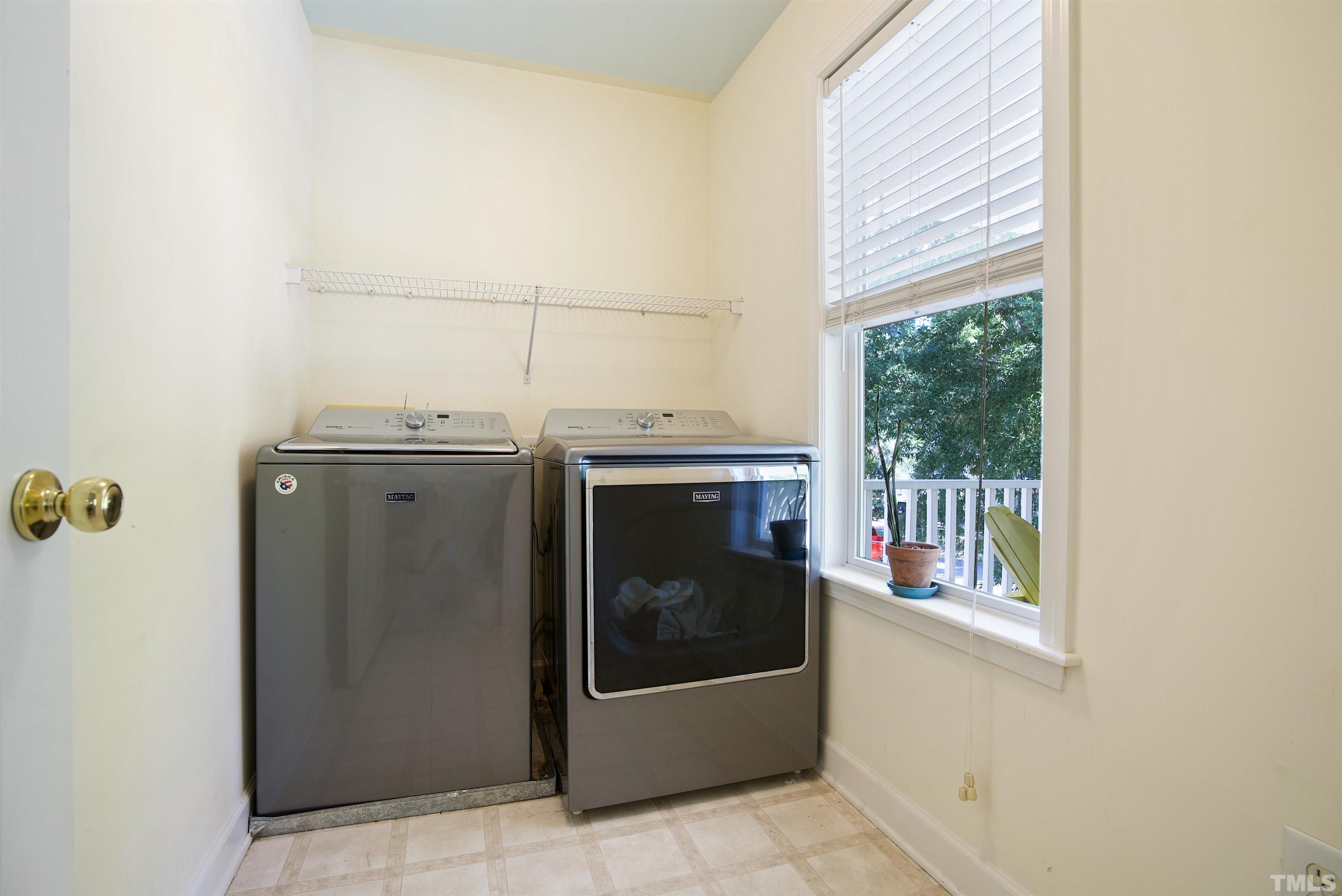 3421 Suncrest Village Lane Raleigh, NC 27616 - Photo 18 of 29 a utility room with dryer and washer
