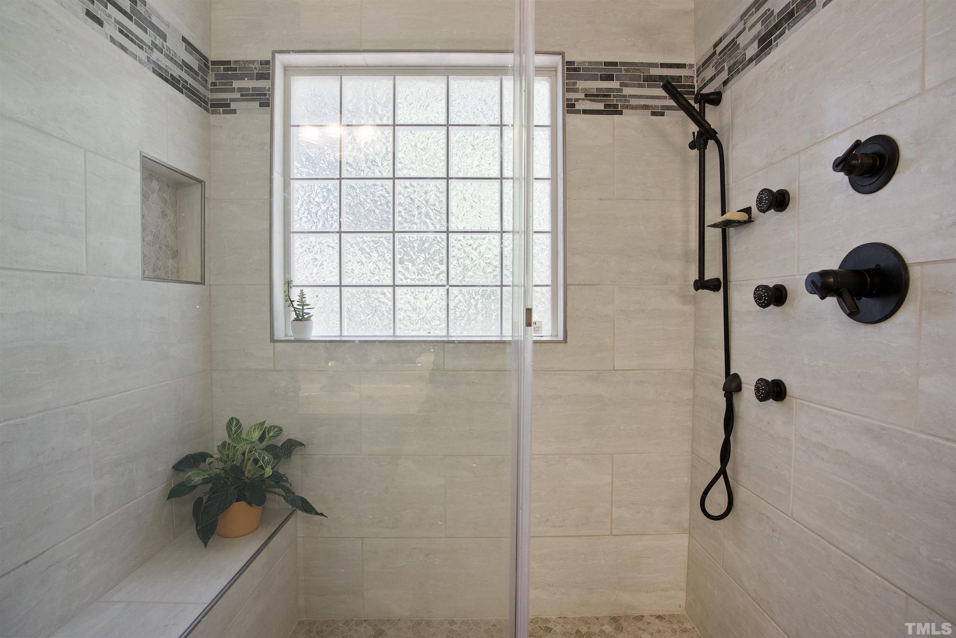 3421 Suncrest Village Lane Raleigh, NC 27616 - Photo 26 of 29 a bathroom with a shower