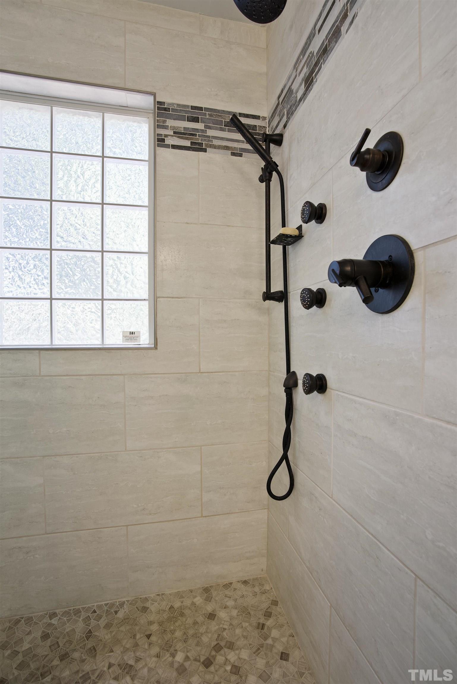 3421 Suncrest Village Lane Raleigh, NC 27616 - Photo 27 of 29 a bathroom with a shower