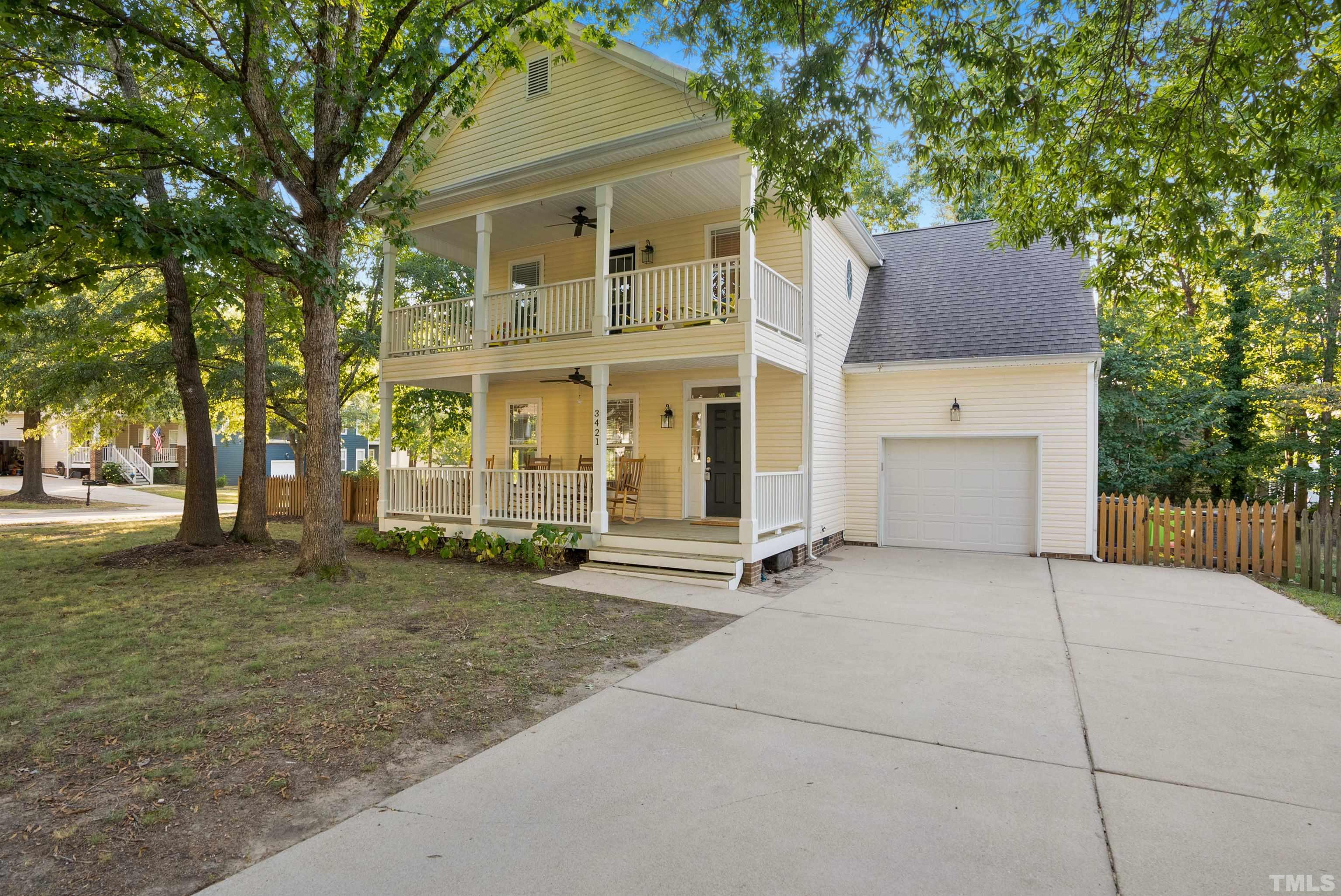 3421 Suncrest Village Lane Raleigh, NC 27616 - Photo 3 of 29 front view of a house with a yard and trees