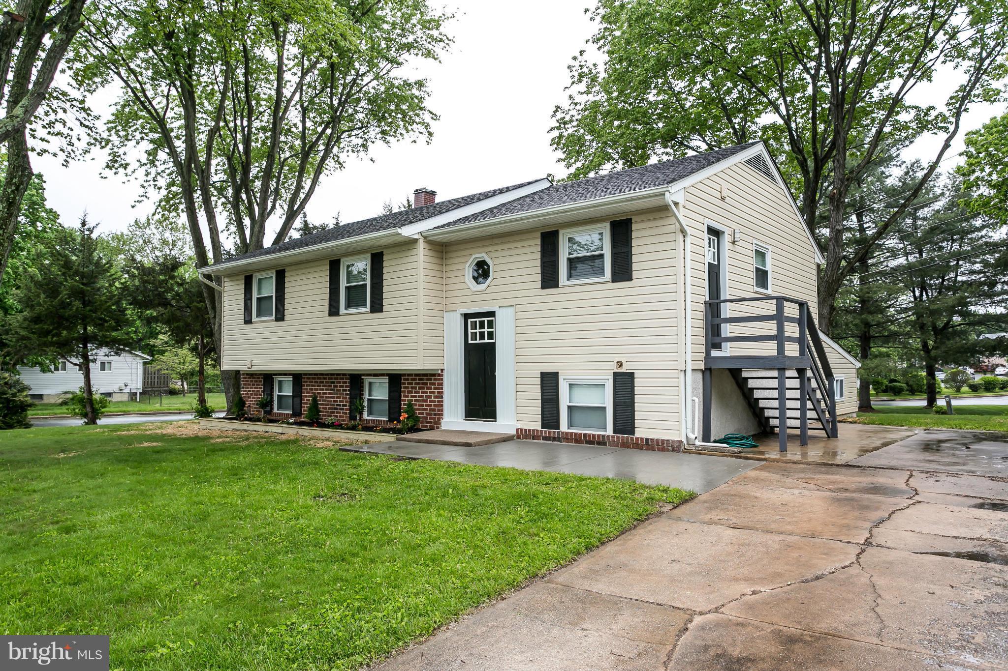 200 Highfalcon Road Reisterstown, MD 21136 - Photo 1 of 28 a view of a house with a yard and sitting area