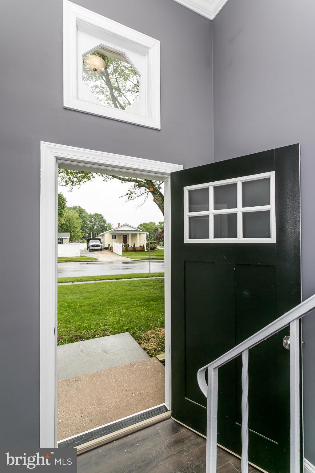 200 Highfalcon Road Reisterstown, MD 21136 - Photo 2 of 28 a view of backyard with large window and wooden floor