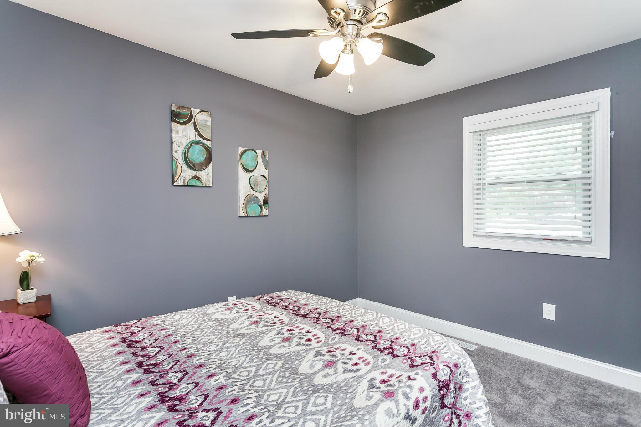 200 Highfalcon Road Reisterstown, MD 21136 - Photo 12 of 28 a bedroom with a bed and a window