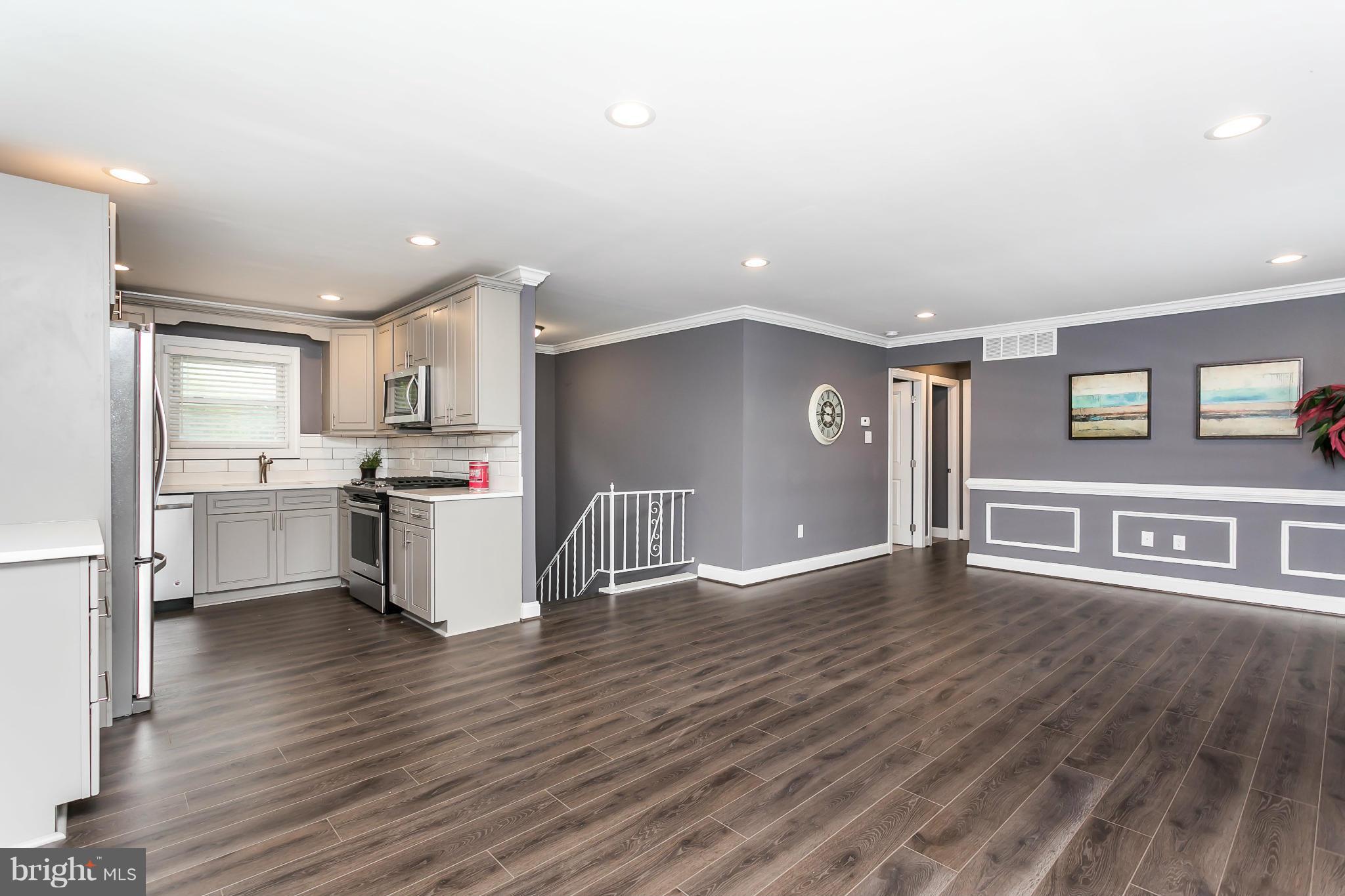 200 Highfalcon Road Reisterstown, MD 21136 - Photo 5 of 28 a view of a kitchen with wooden floor