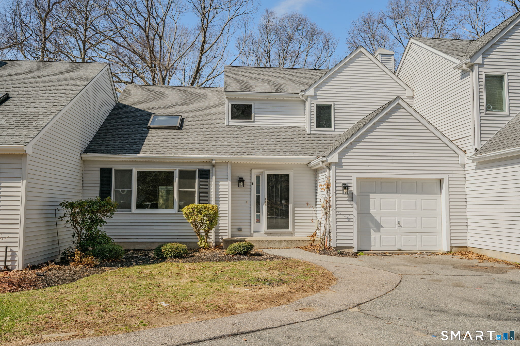 5 Windy Ridge Place, Unit 5 Waterford, CT 06385 - Photo 1 of 37 a view of a house with outdoor space
