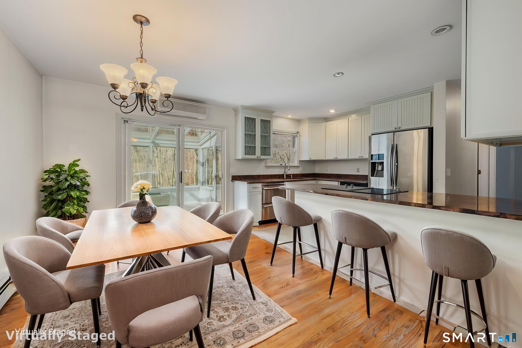 5 Windy Ridge Place, Unit 5 Waterford, CT 06385 - Photo 13 of 37 a view of a dining room with furniture window and wooden floor
