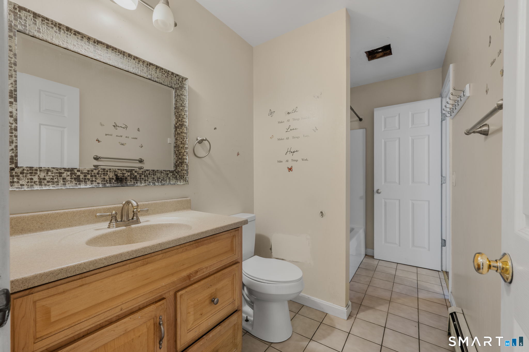 5 Windy Ridge Place, Unit 5 Waterford, CT 06385 - Photo 16 of 37 a bathroom with a sink toilet and shower