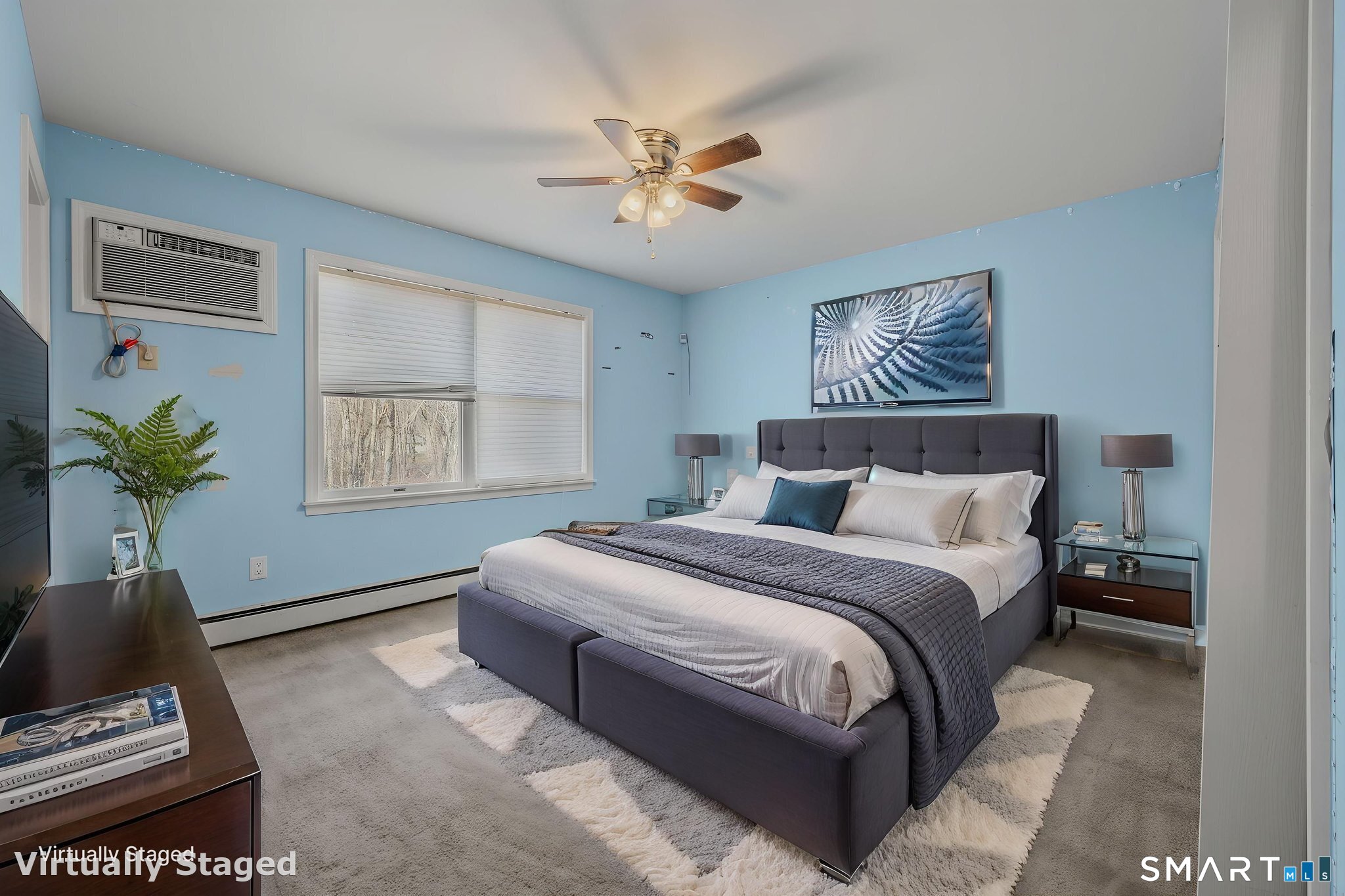 5 Windy Ridge Place, Unit 5 Waterford, CT 06385 - Photo 18 of 37 a bedroom with a large bed and a window