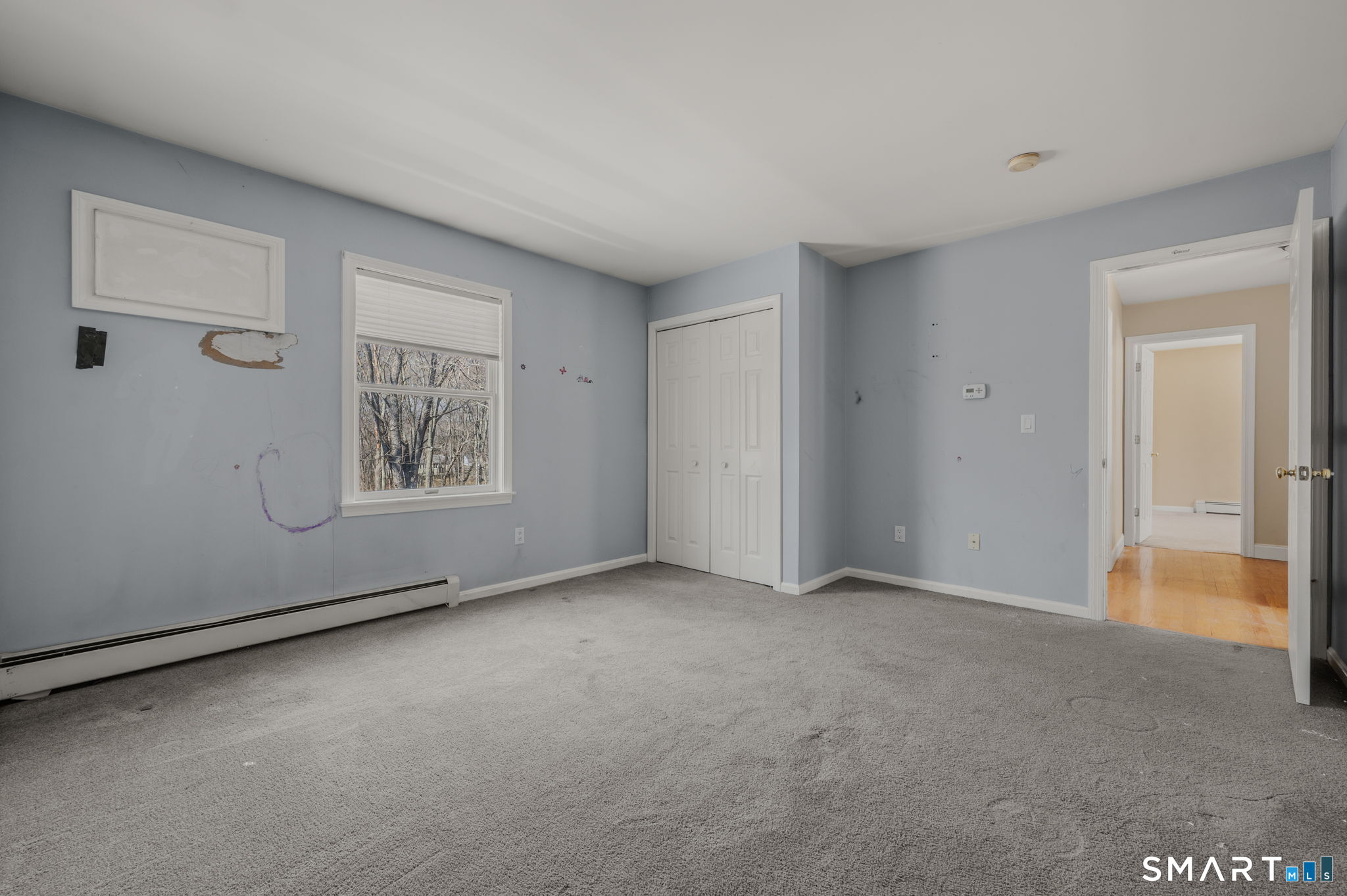 5 Windy Ridge Place, Unit 5 Waterford, CT 06385 - Photo 21 of 37 a view of an empty room with a window