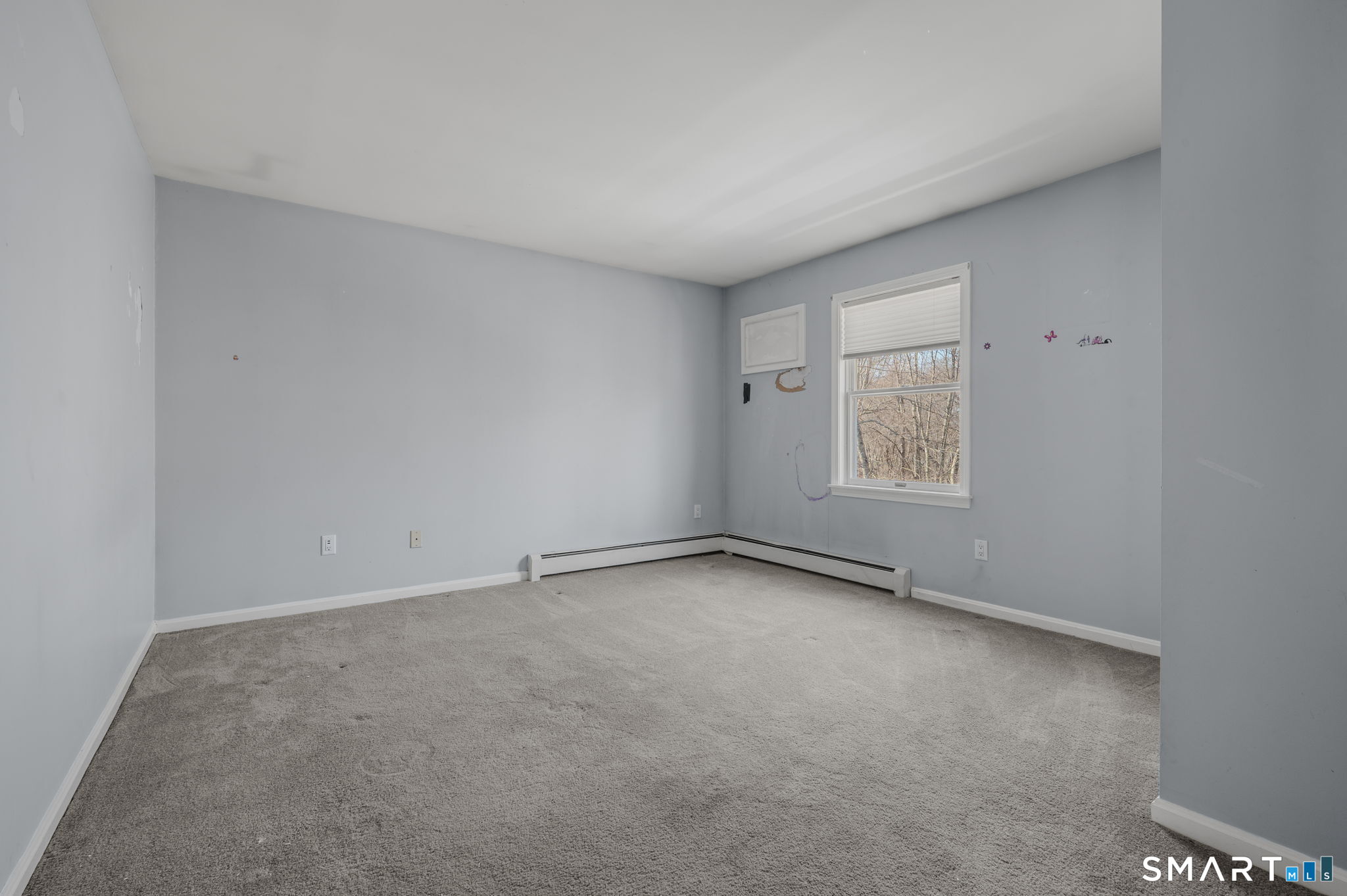 5 Windy Ridge Place, Unit 5 Waterford, CT 06385 - Photo 22 of 37 an empty room with a window