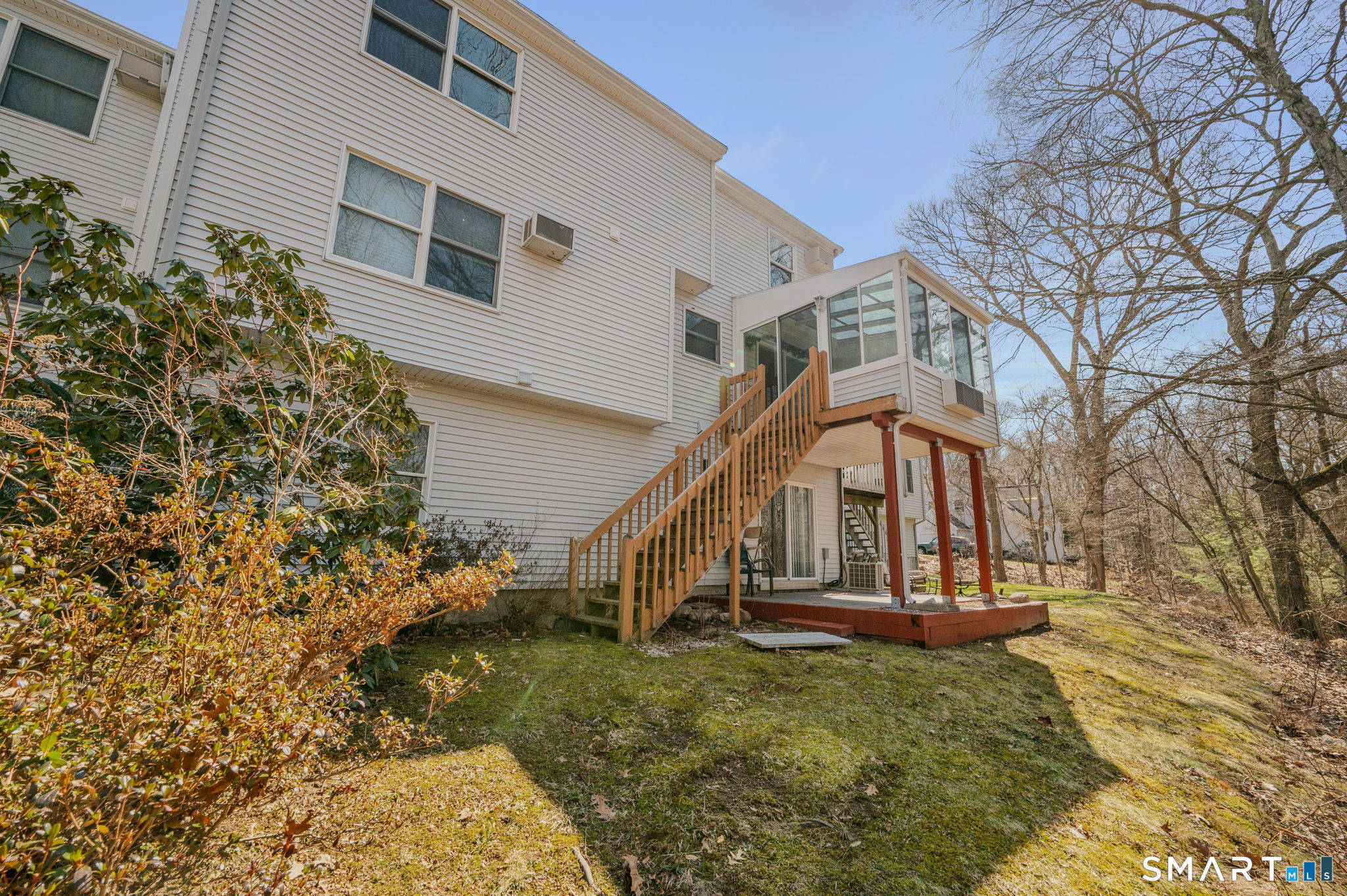 5 Windy Ridge Place, Unit 5 Waterford, CT 06385 - Photo 34 of 37 a view of a house with a yard
