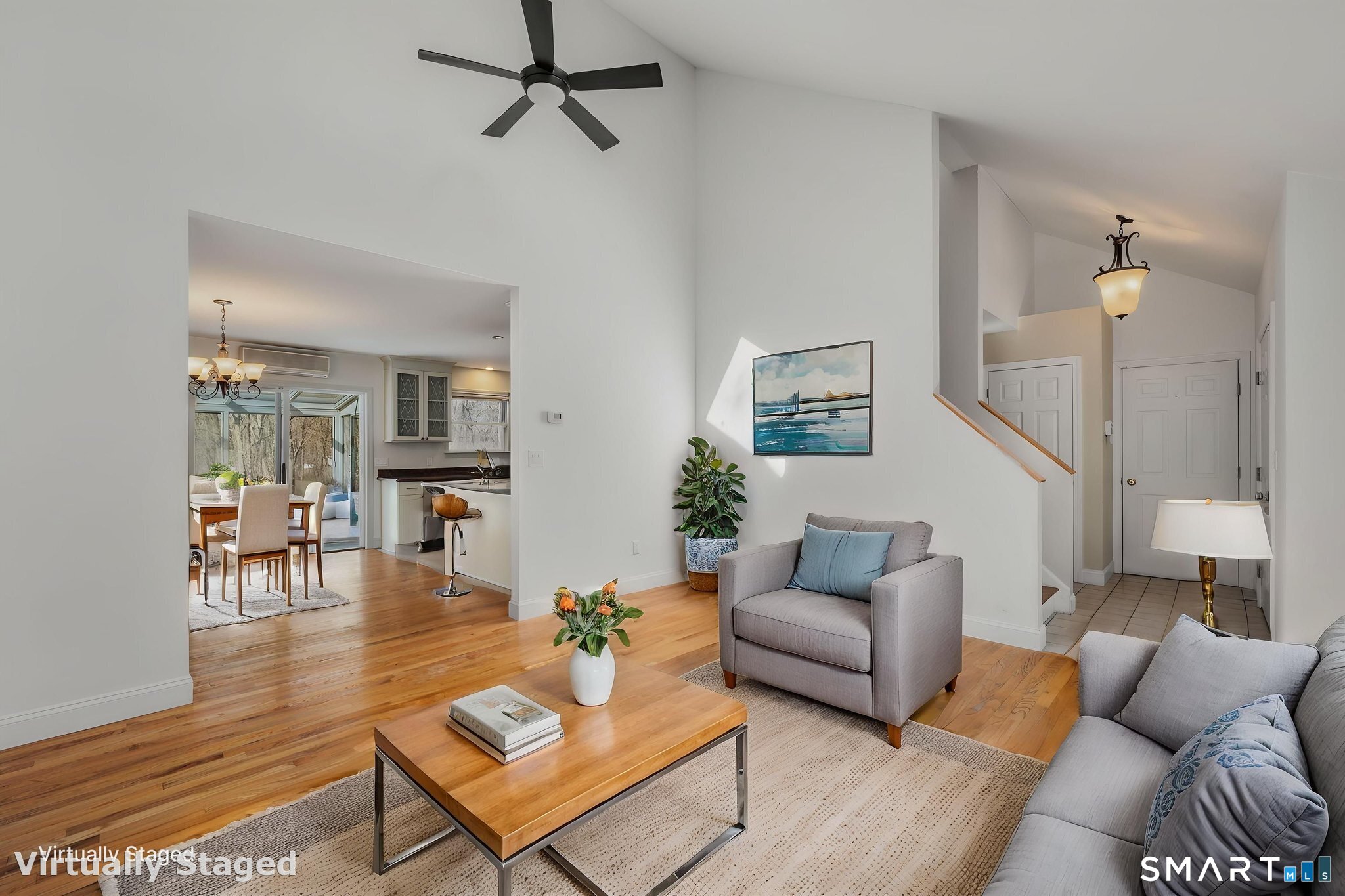 5 Windy Ridge Place, Unit 5 Waterford, CT 06385 - Photo 4 of 37 a living room with furniture and wooden floor