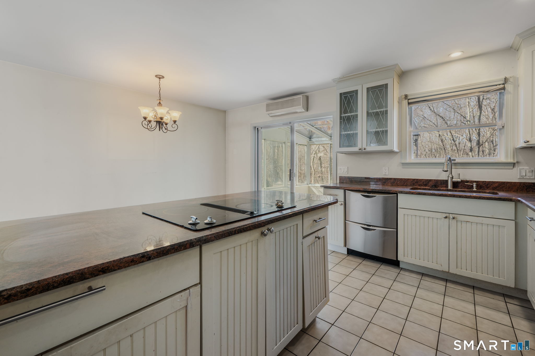 5 Windy Ridge Place, Unit 5 Waterford, CT 06385 - Photo 10 of 37 a kitchen with granite countertop a sink and a stove