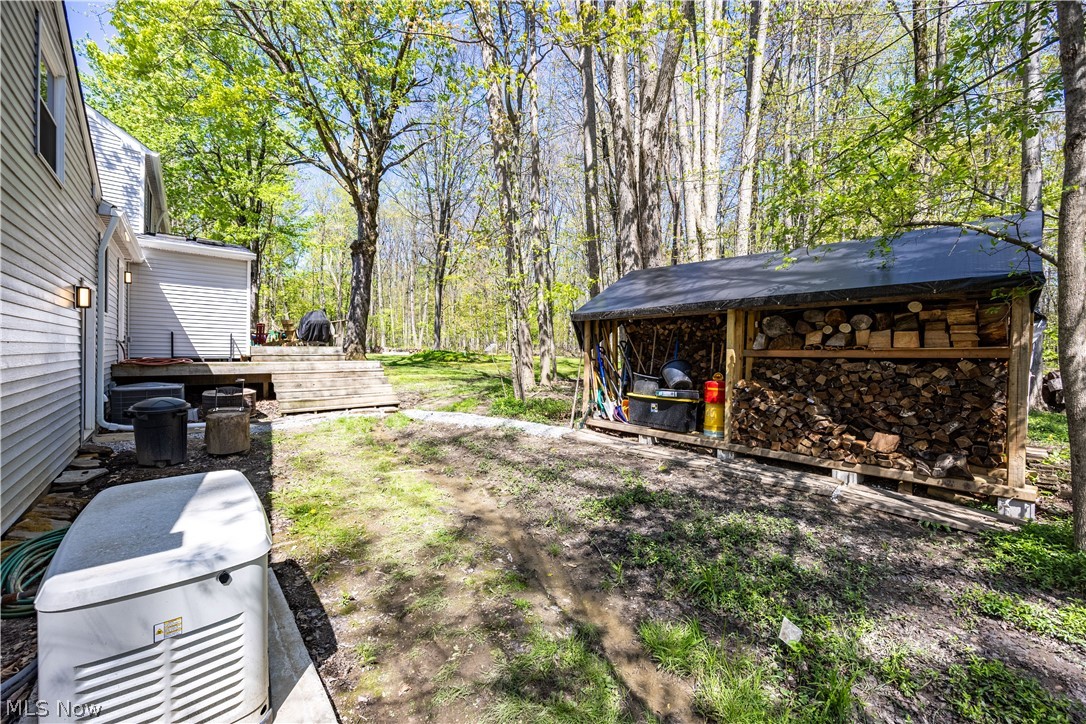 31599 Fairview Road Chagrin Falls, OH 44022 - Photo 47 of 50 There's plenty of fuel in the protected wood pile to stoke warm comfort during those cooler evenings