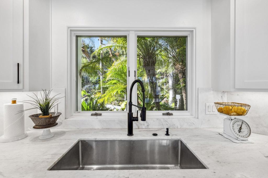 3443 Country Road Fallbrook, CA 92028 - Photo 22 of 71 a kitchen with a sink and a large window