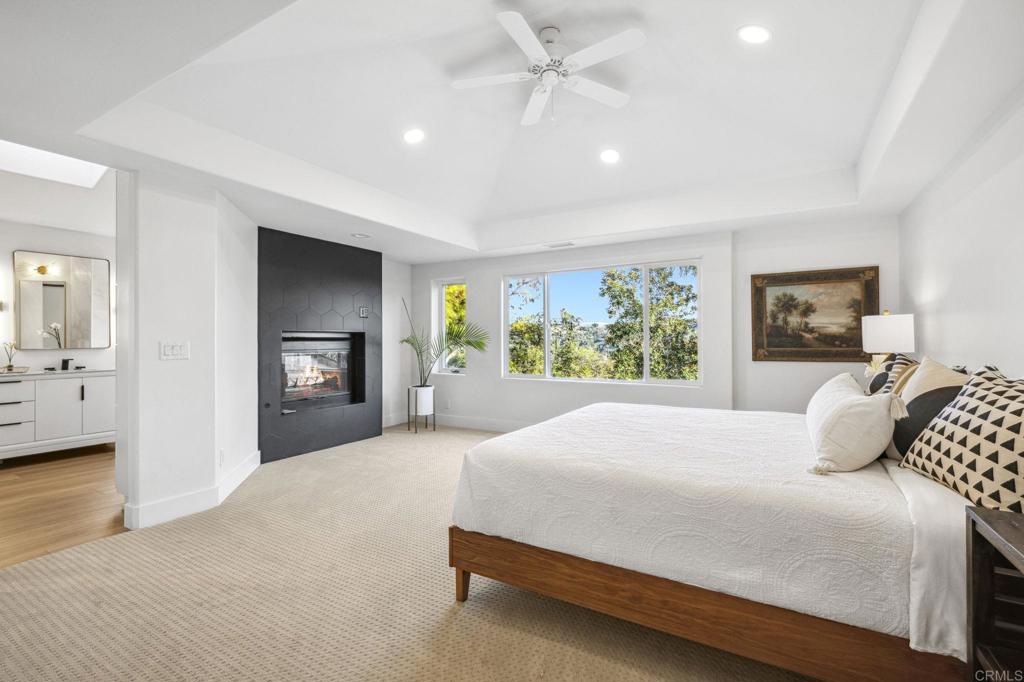 3443 Country Road Fallbrook, CA 92028 - Photo 24 of 71 a bedroom with a large bed and a dresser