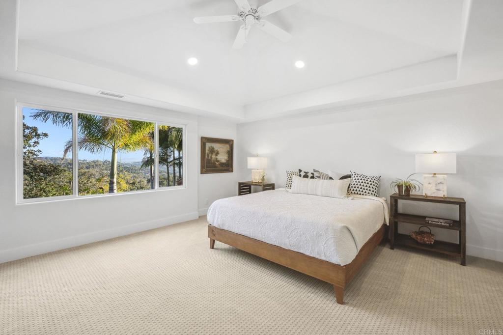 3443 Country Road Fallbrook, CA 92028 - Photo 26 of 71 a bedroom with a large bed and a window
