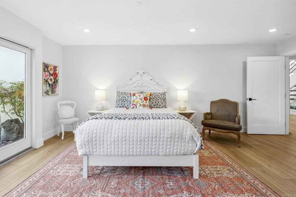 3443 Country Road Fallbrook, CA 92028 - Photo 31 of 71 a bedroom with a bed and wooden floor