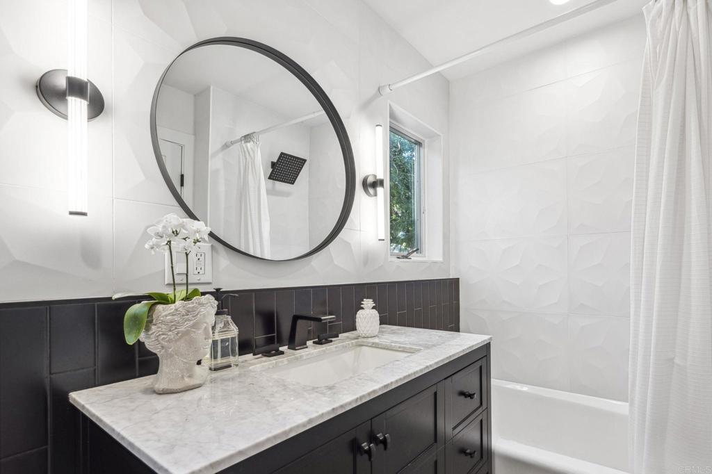 3443 Country Road Fallbrook, CA 92028 - Photo 36 of 71 a bathroom with a sink and a mirror