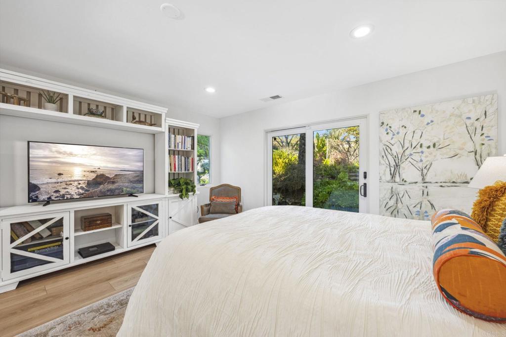 3443 Country Road Fallbrook, CA 92028 - Photo 38 of 71 a bedroom with a bed and a flat screen tv