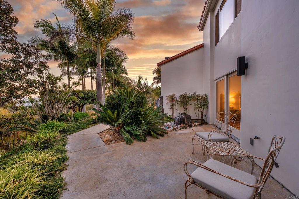 3443 Country Road Fallbrook, CA 92028 - Photo 58 of 71 a backyard of a house with table and chairs