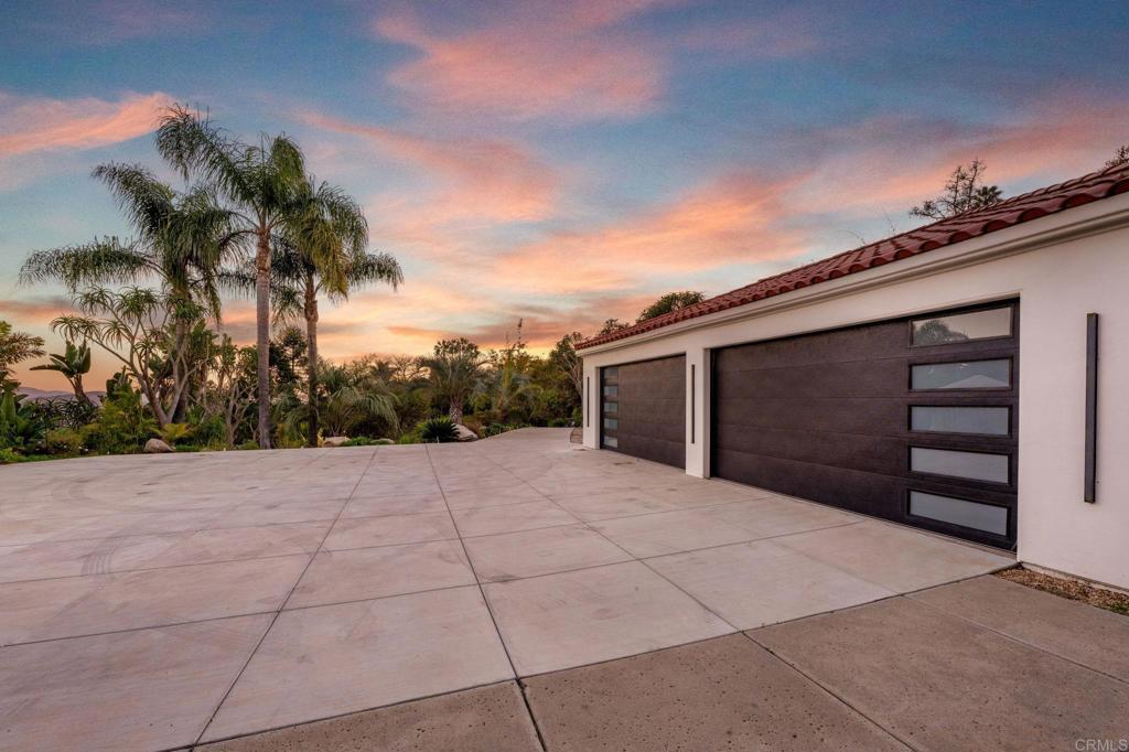 3443 Country Road Fallbrook, CA 92028 - Photo 66 of 71 a front view of a house with a yard and garage