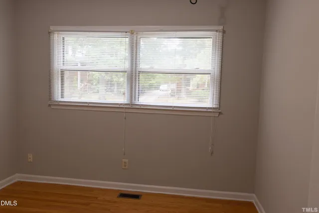 a view of a bathroom from a hallway