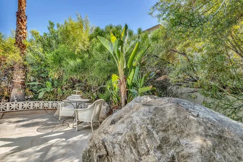 a kitchen with a sink stove and refrigerator