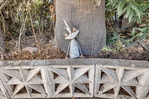 a bedroom with a bed and hallway