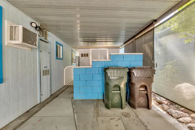 a view of empty room with windows