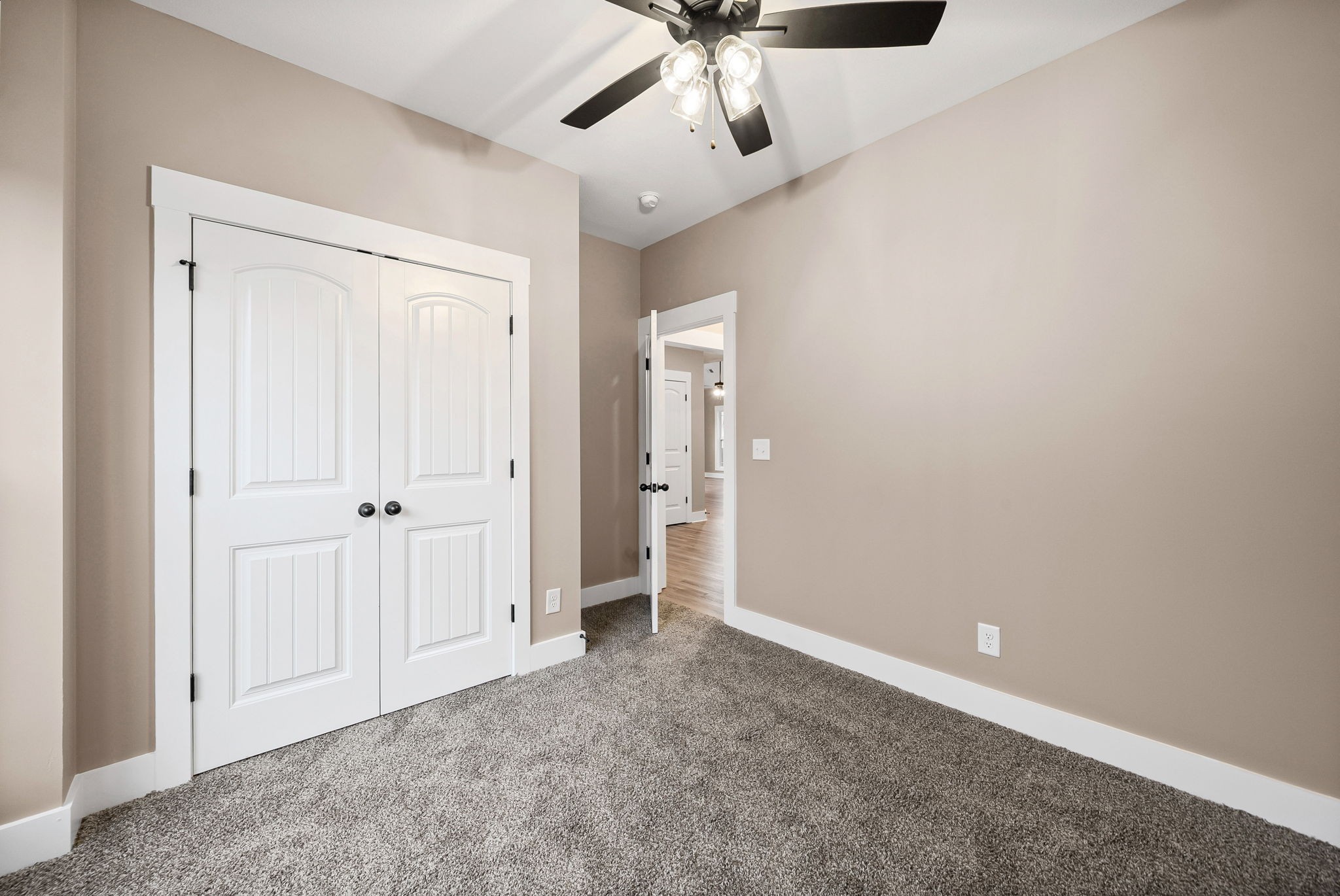 369 Timber Springs Clarksville, TN 37042 - Photo 14 of 23 an empty room with a ceiling fan and carpet