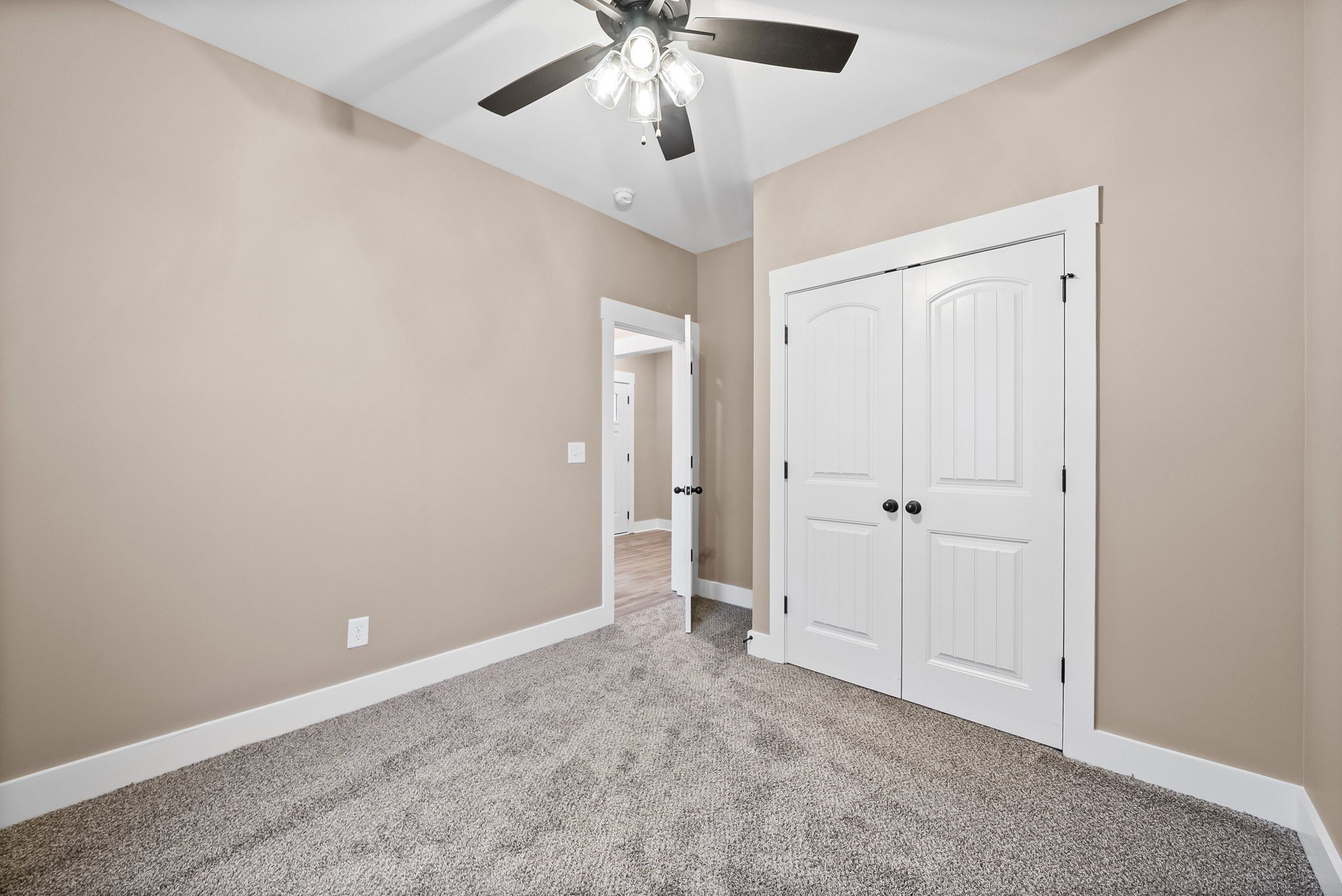 369 Timber Springs Clarksville, TN 37042 - Photo 15 of 23 an empty room with chandelier fan and windows