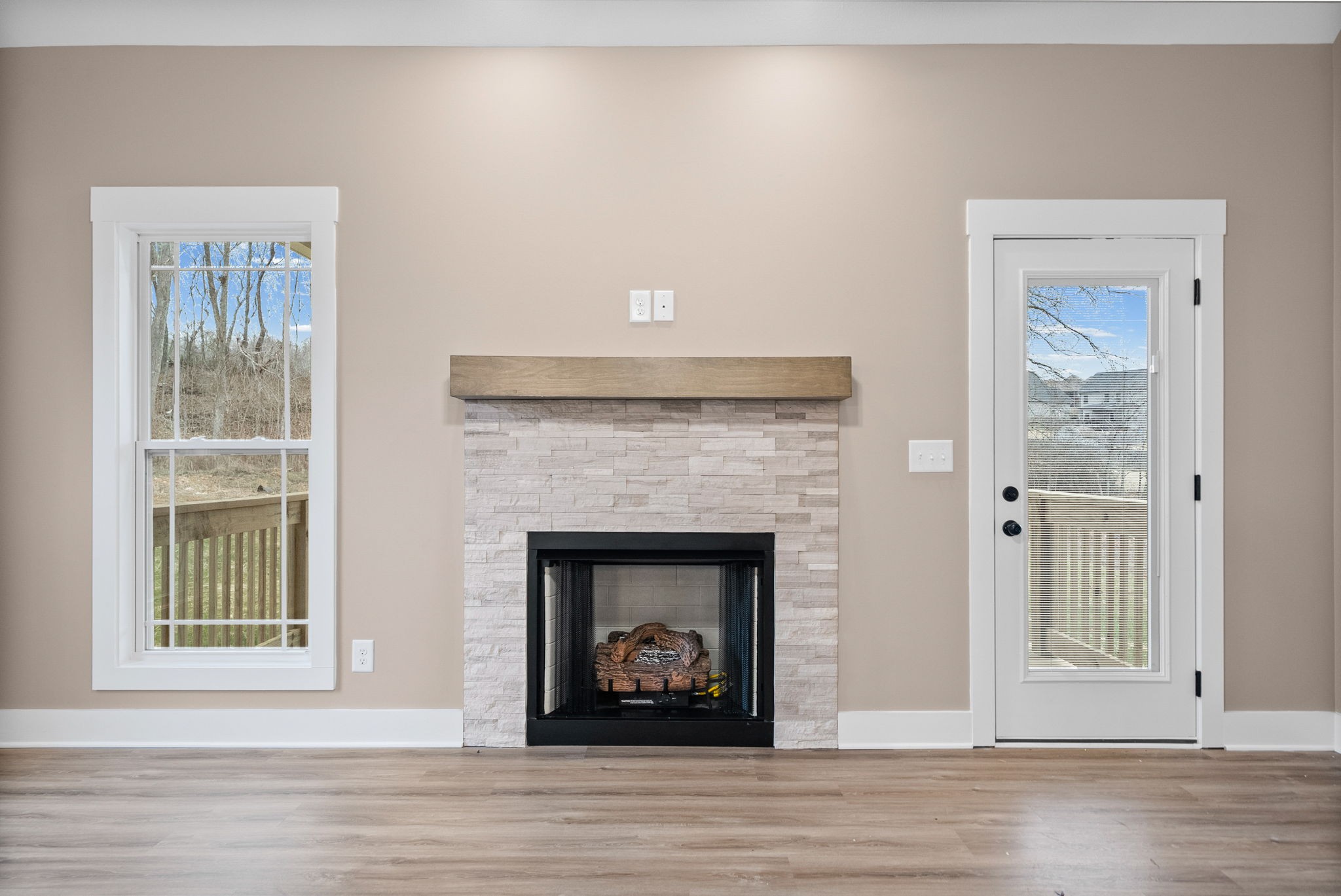 369 Timber Springs Clarksville, TN 37042 - Photo 5 of 23 a view of an empty room with wooden floor and a window