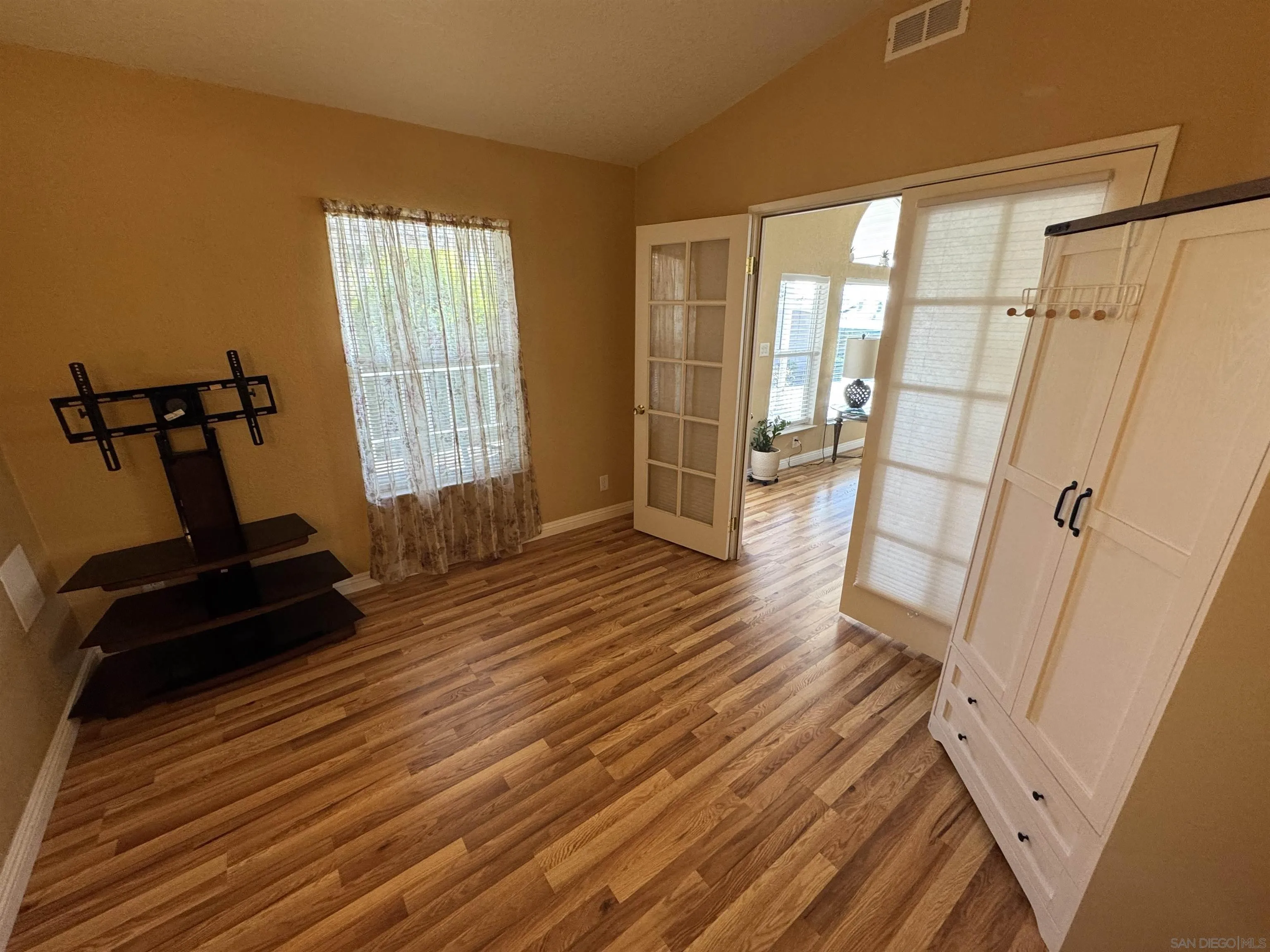 12250 Vista Del Cajon Road, Unit 25 El Cajon, CA 92021 - Photo 23 of 39 a view of empty room with wooden floor and fan