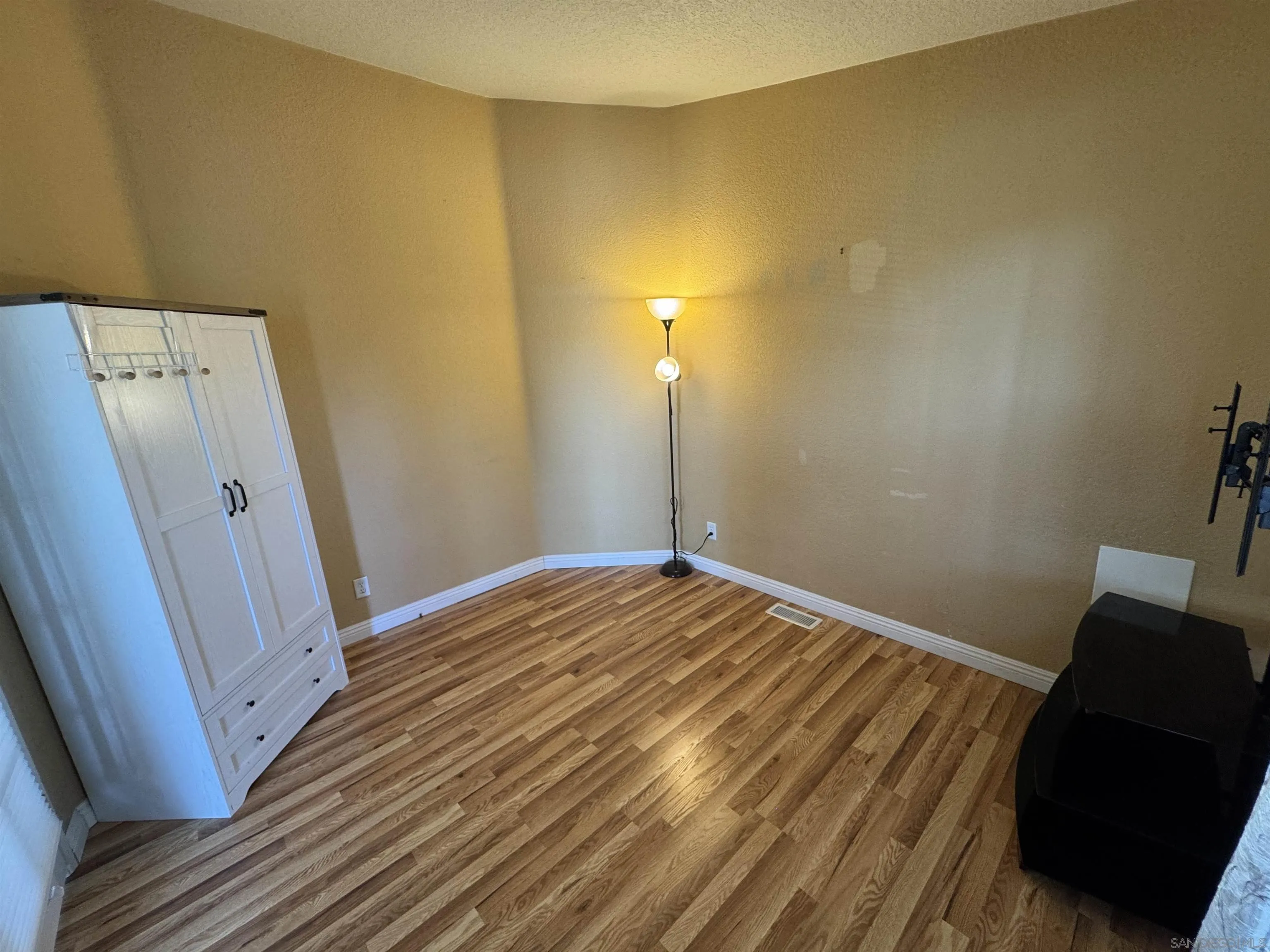 12250 Vista Del Cajon Road, Unit 25 El Cajon, CA 92021 - Photo 24 of 39 a view of a room with wooden floor and a sink