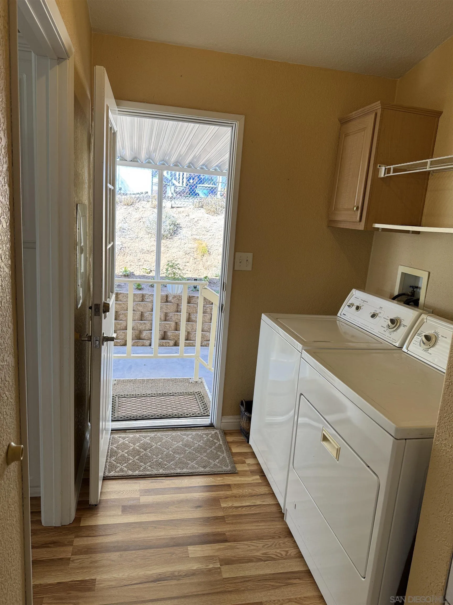 12250 Vista Del Cajon Road, Unit 25 El Cajon, CA 92021 - Photo 26 of 39 a utility room with dryer and washer