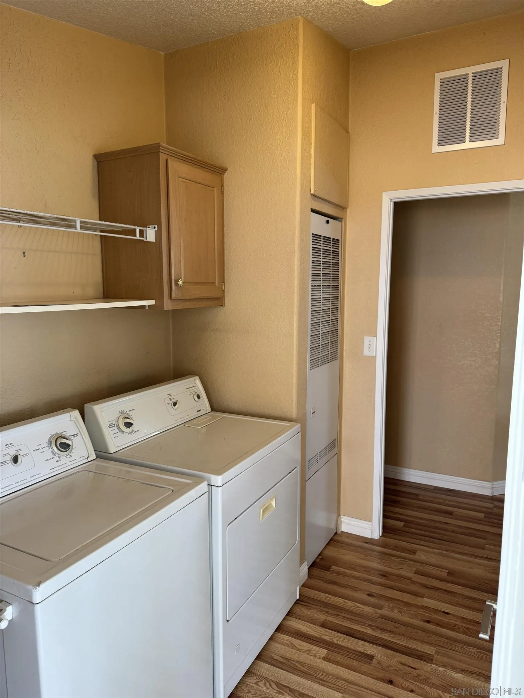 12250 Vista Del Cajon Road, Unit 25 El Cajon, CA 92021 - Photo 27 of 39 a utility room with dryer and washer