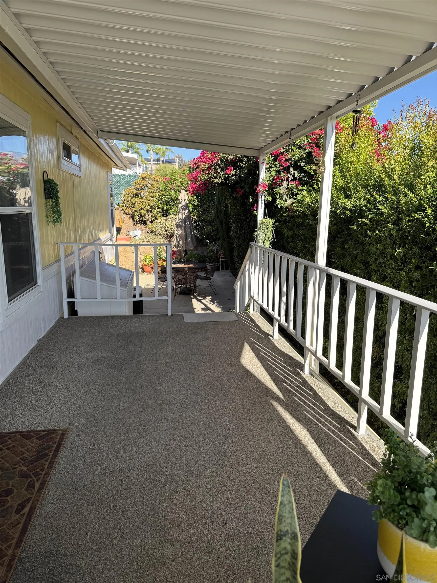 12250 Vista Del Cajon Road, Unit 25 El Cajon, CA 92021 - Photo 29 of 39 a view of a porch with furniture