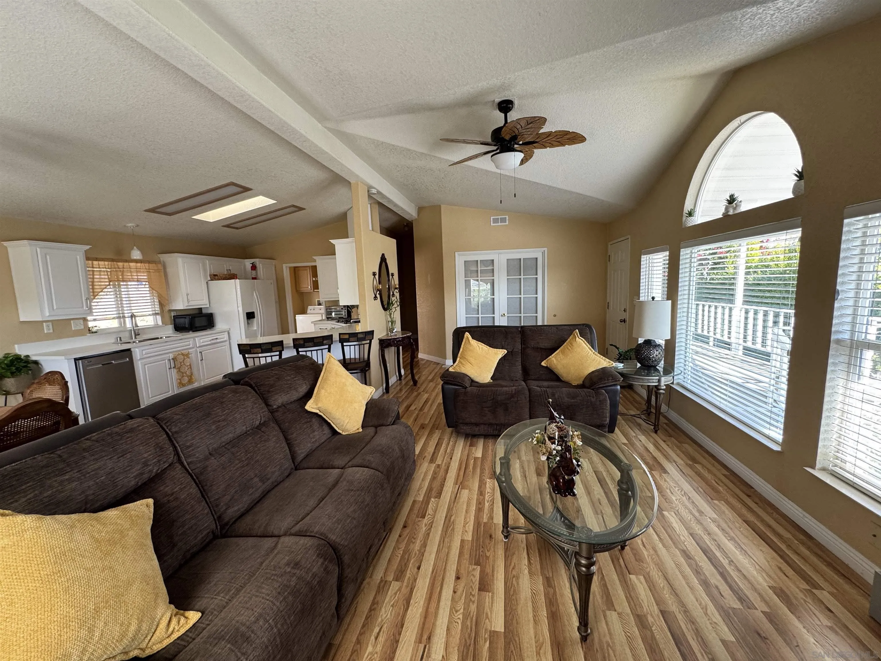 12250 Vista Del Cajon Road, Unit 25 El Cajon, CA 92021 - Photo 4 of 39 a living room with furniture and a large window