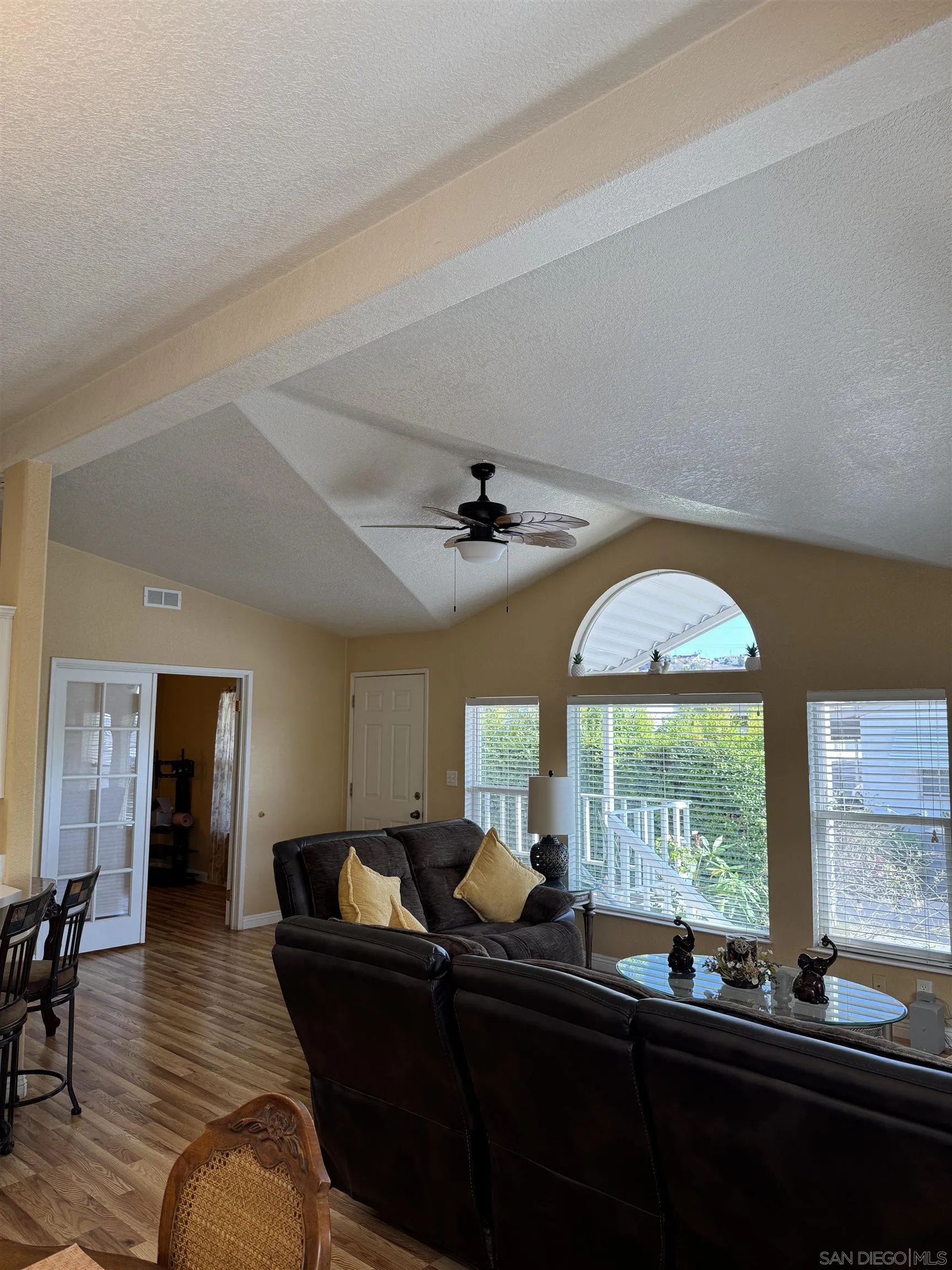 12250 Vista Del Cajon Road, Unit 25 El Cajon, CA 92021 - Photo 7 of 39 a living room with furniture and a large window