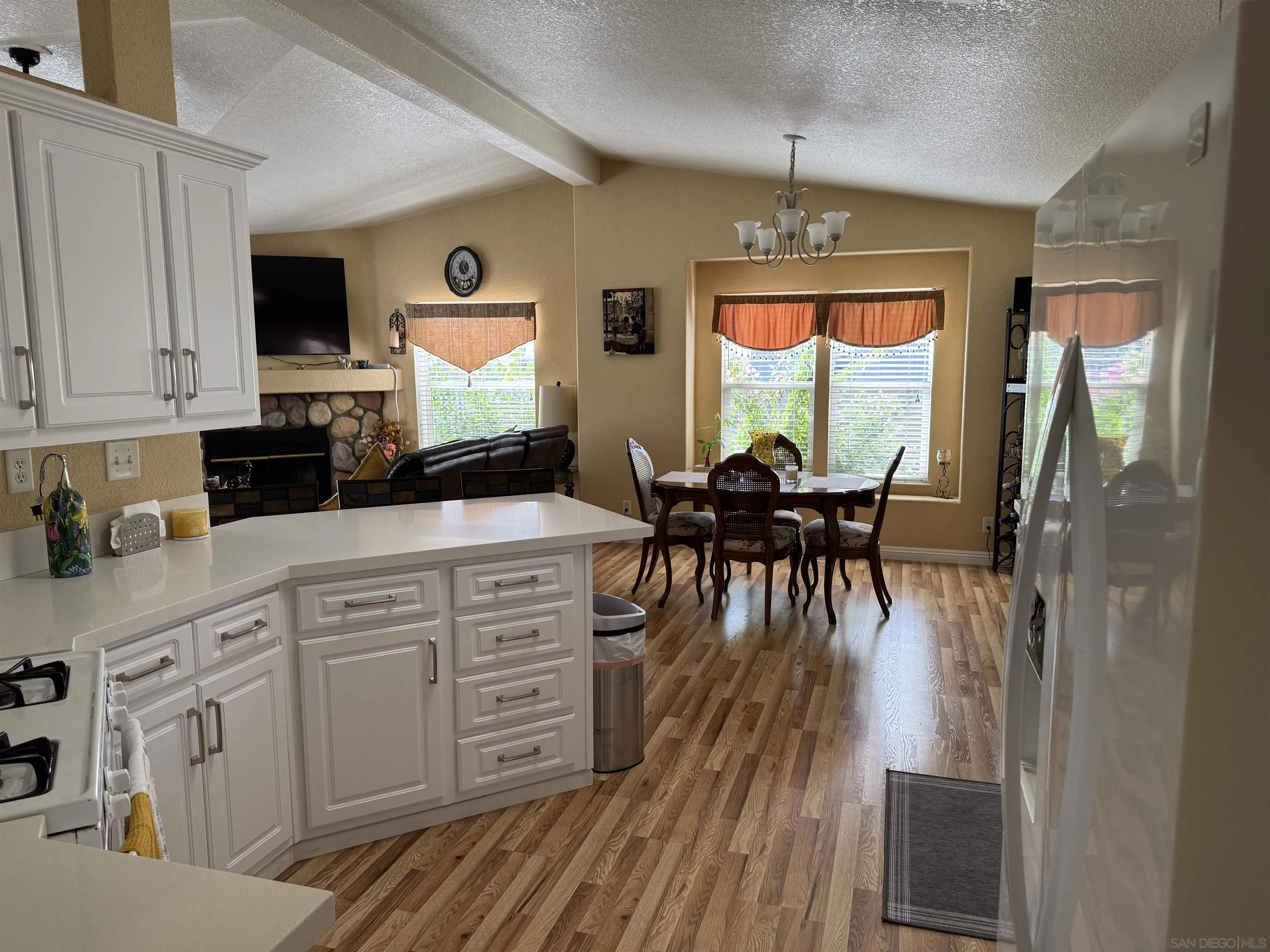12250 Vista Del Cajon Road, Unit 25 El Cajon, CA 92021 - Photo 9 of 39 a view of a dining room with furniture window and outside view