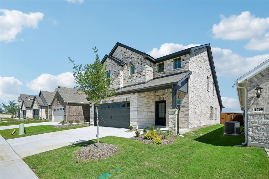 1705 Arches Road Anna, TX 75409 - Photo 2 of 33 a view of a house with a yard and pathway