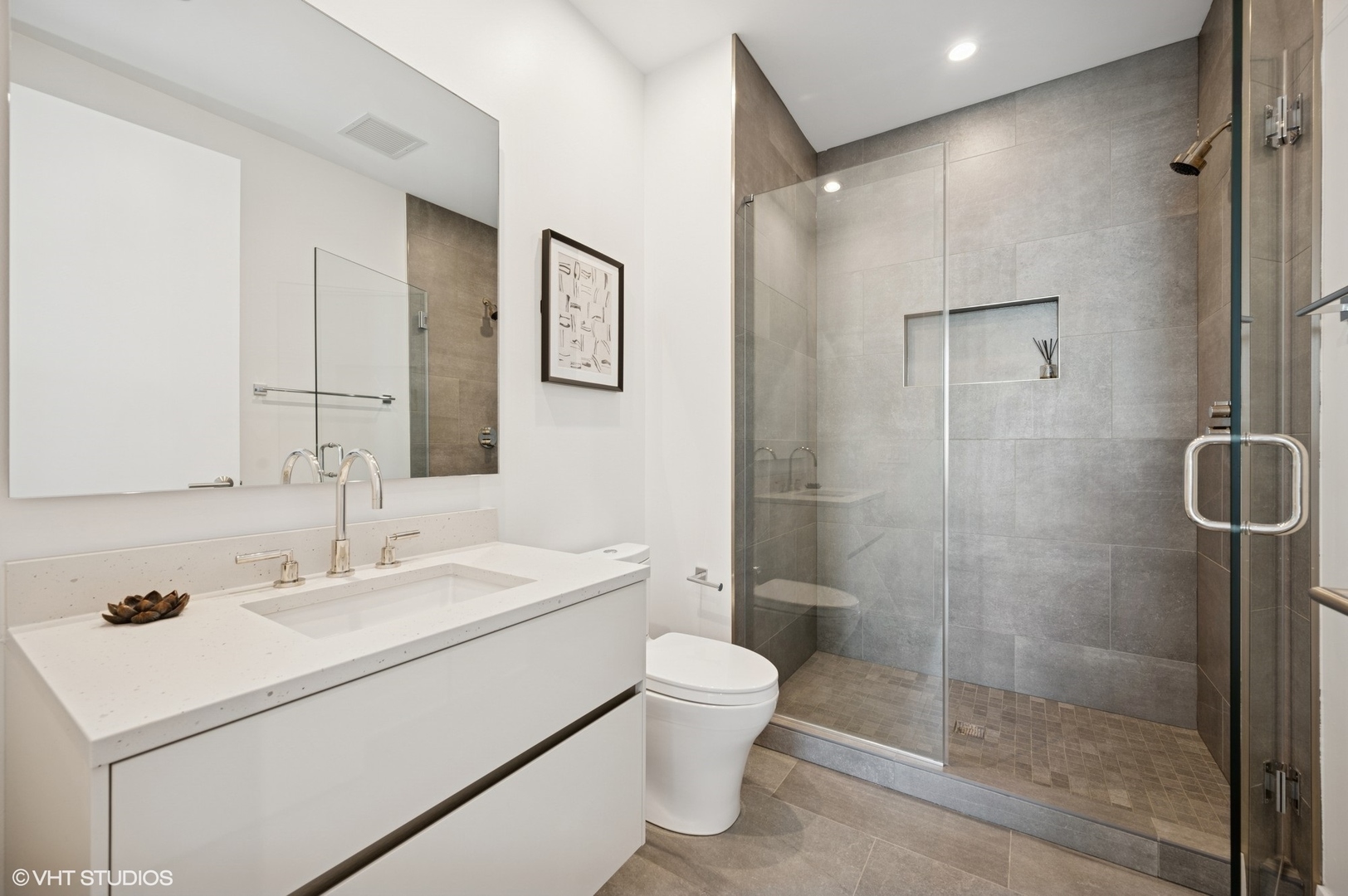 403 North Wabash Avenue, Unit 17C Chicago, IL 60611 - Photo 22 of 30 a bathroom with a sink toilet and shower