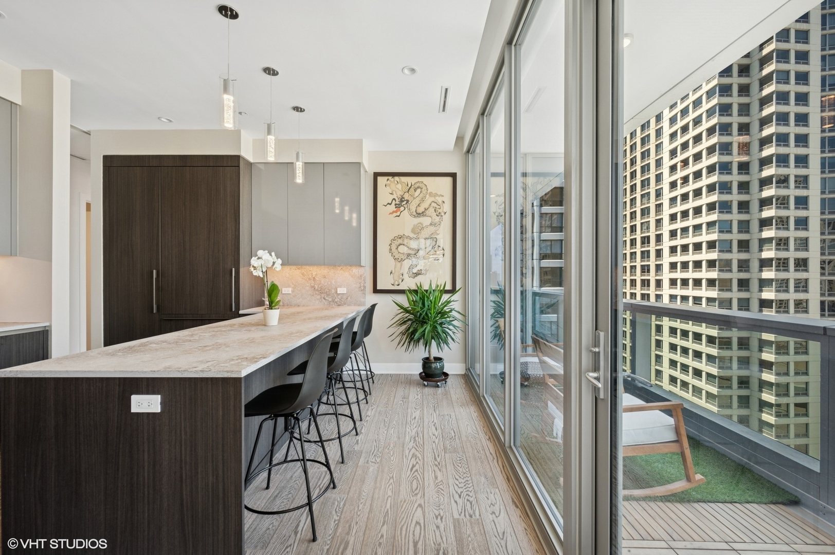 403 North Wabash Avenue, Unit 17C Chicago, IL 60611 - Photo 9 of 30 a view of a hallway with furniture and wooden floor
